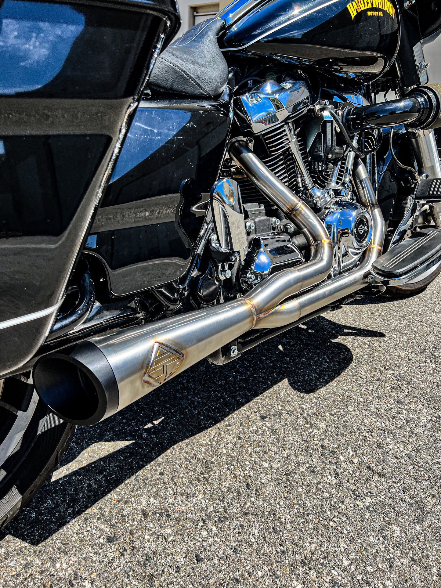 Stainless steel Cutback Exhaust close up on Harley Davidson M8 Bagger Motorcycle